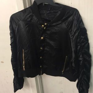 Black and gold bomber jacket
